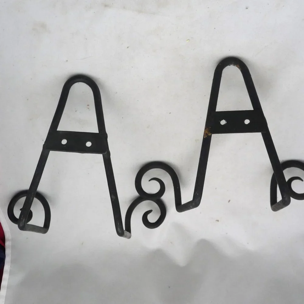 2 cast iron plate wall brackets forged Southwest country